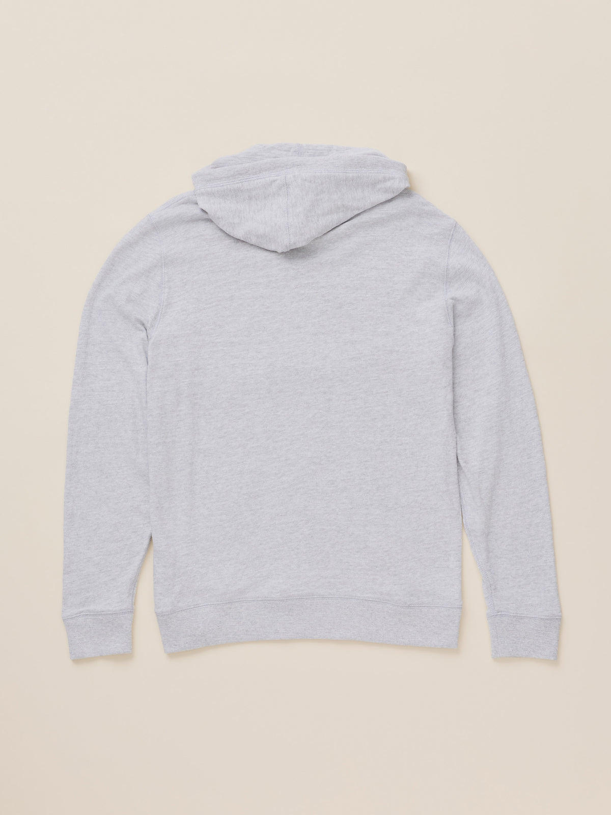 A light gray heathered hoodie shown from the back, laid flat against a solid beige background., image 7 of 7