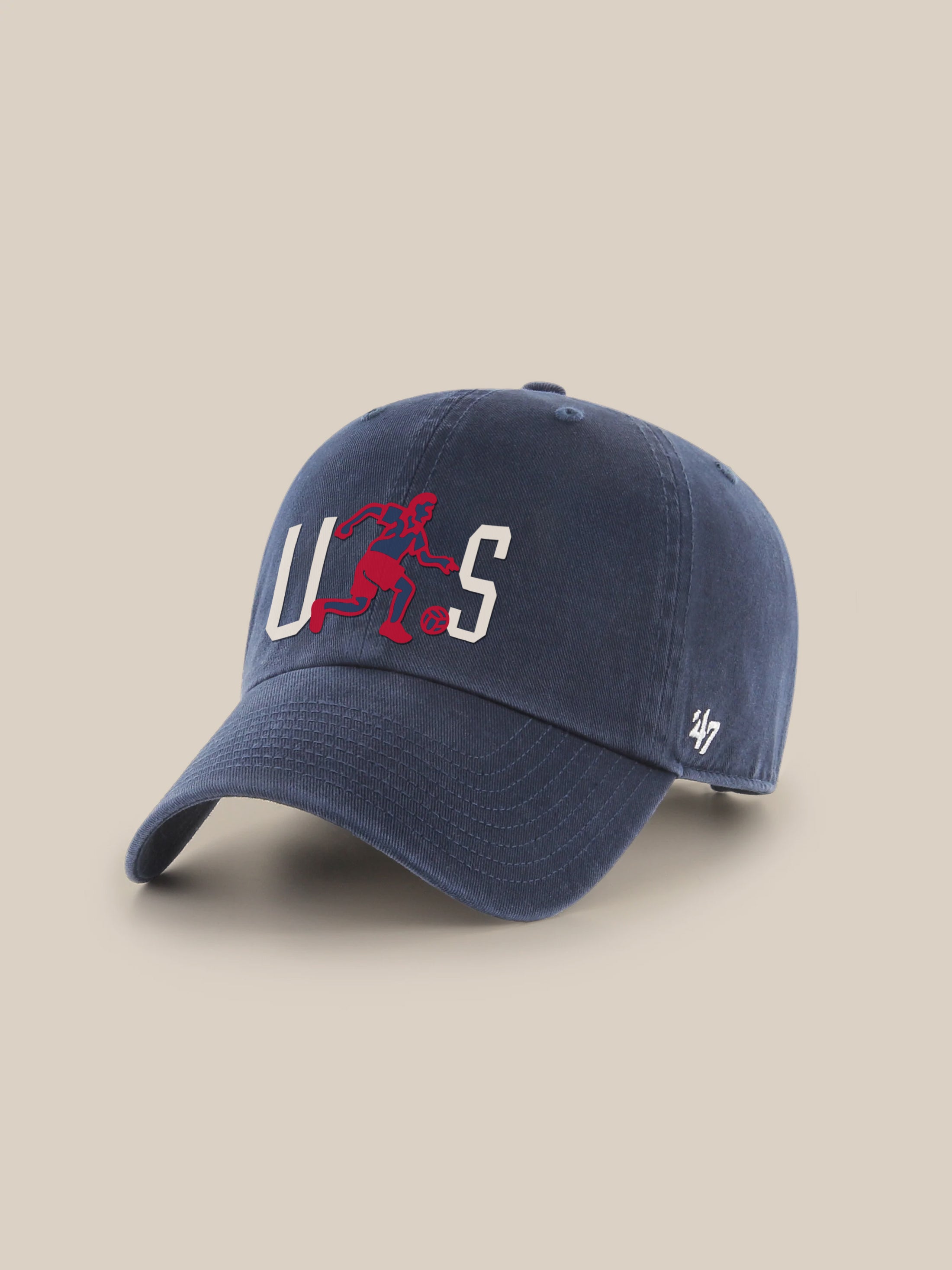 Navy blue cap with red and white logo against a beige background