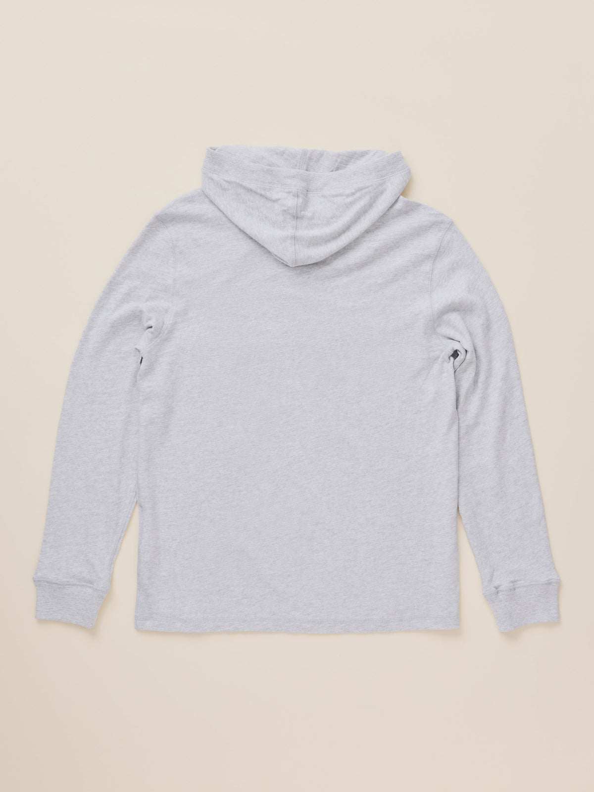 A light gray heathered hooded sweatshirt shown from the back, laid flat on a solid beige background., image 8 of 8