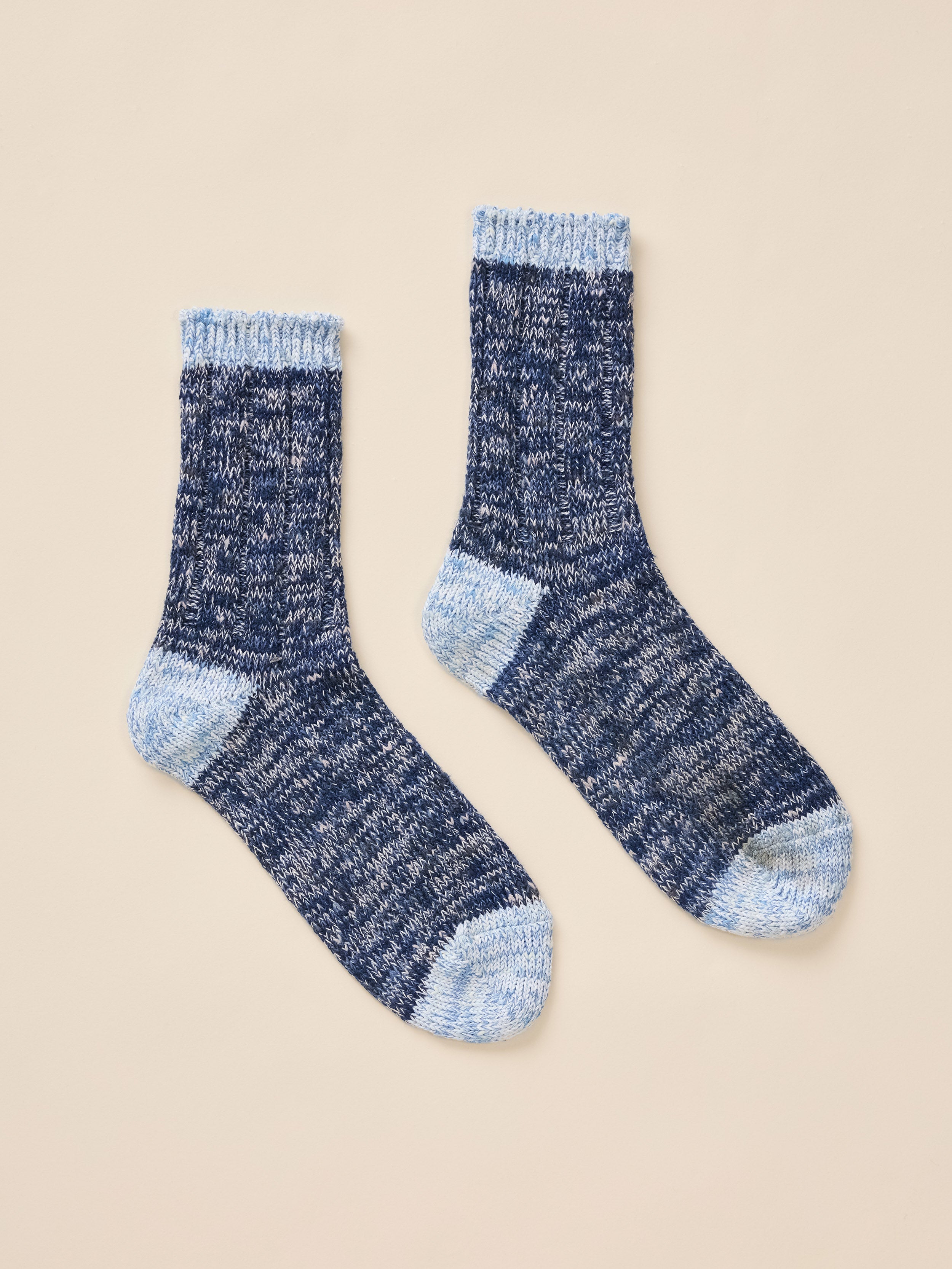 A pair of blue marled socks