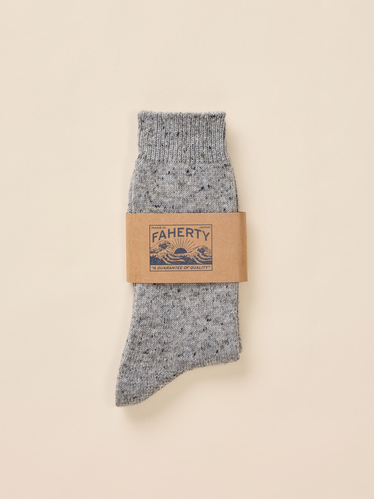 Grey speckled socks in paper Faherty packaging, image 2 of 3