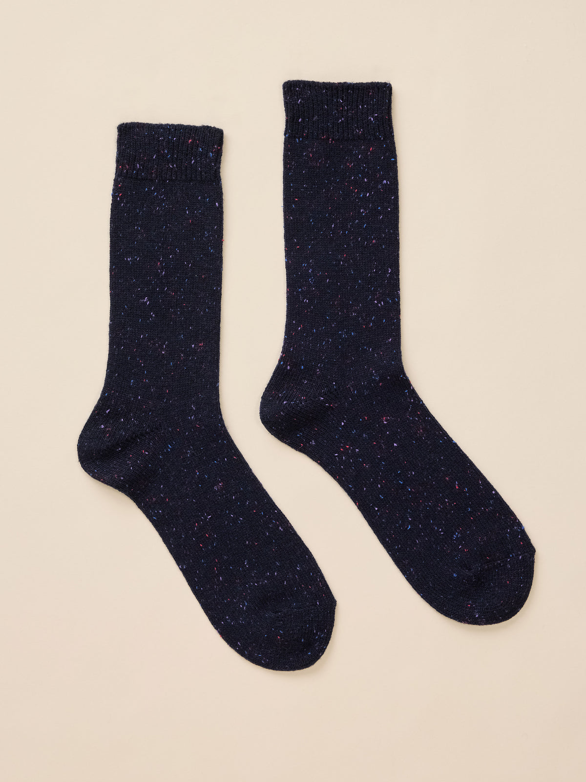 A pair of blue speckled socks, image 1 of 3