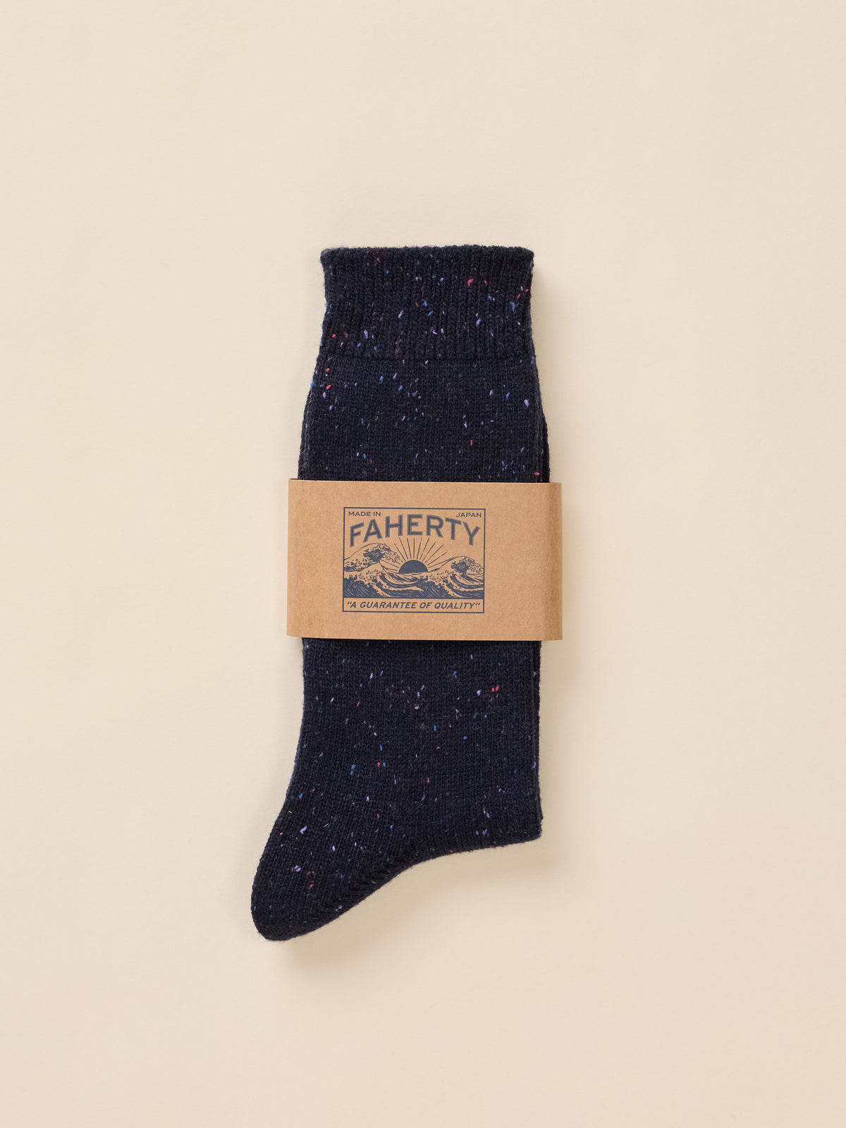 Blue speckled socks in paper Faherty packaging, image 2 of 3
