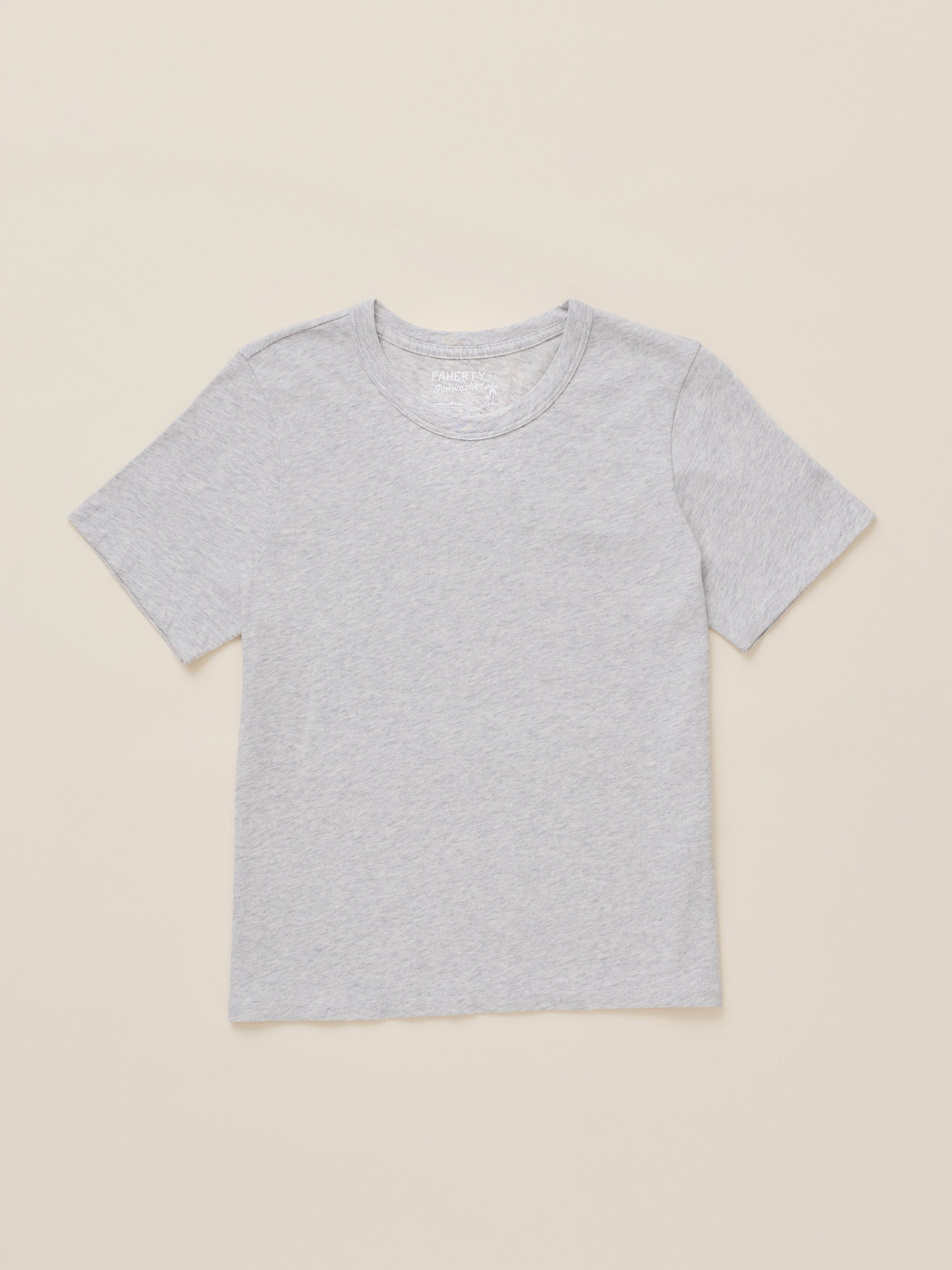 Light grey crewneck t-shirt against a beige background